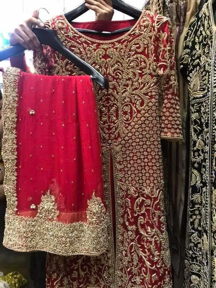 Beautiful bridal lahnga maxi in deep red color work with heavy dabka zari nagh perls and old work Model #B 1112