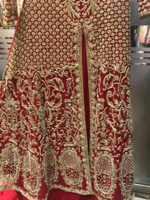Beautiful bridal lahnga maxi in deep red color work with heavy dabka zari nagh perls and old work Model #B 1112