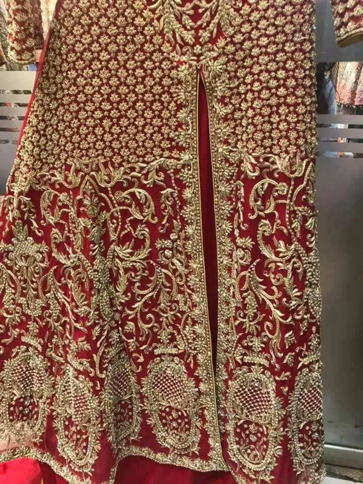 Beautiful bridal lahnga maxi in deep red color work with heavy dabka zari nagh perls and old work Model #B 1112