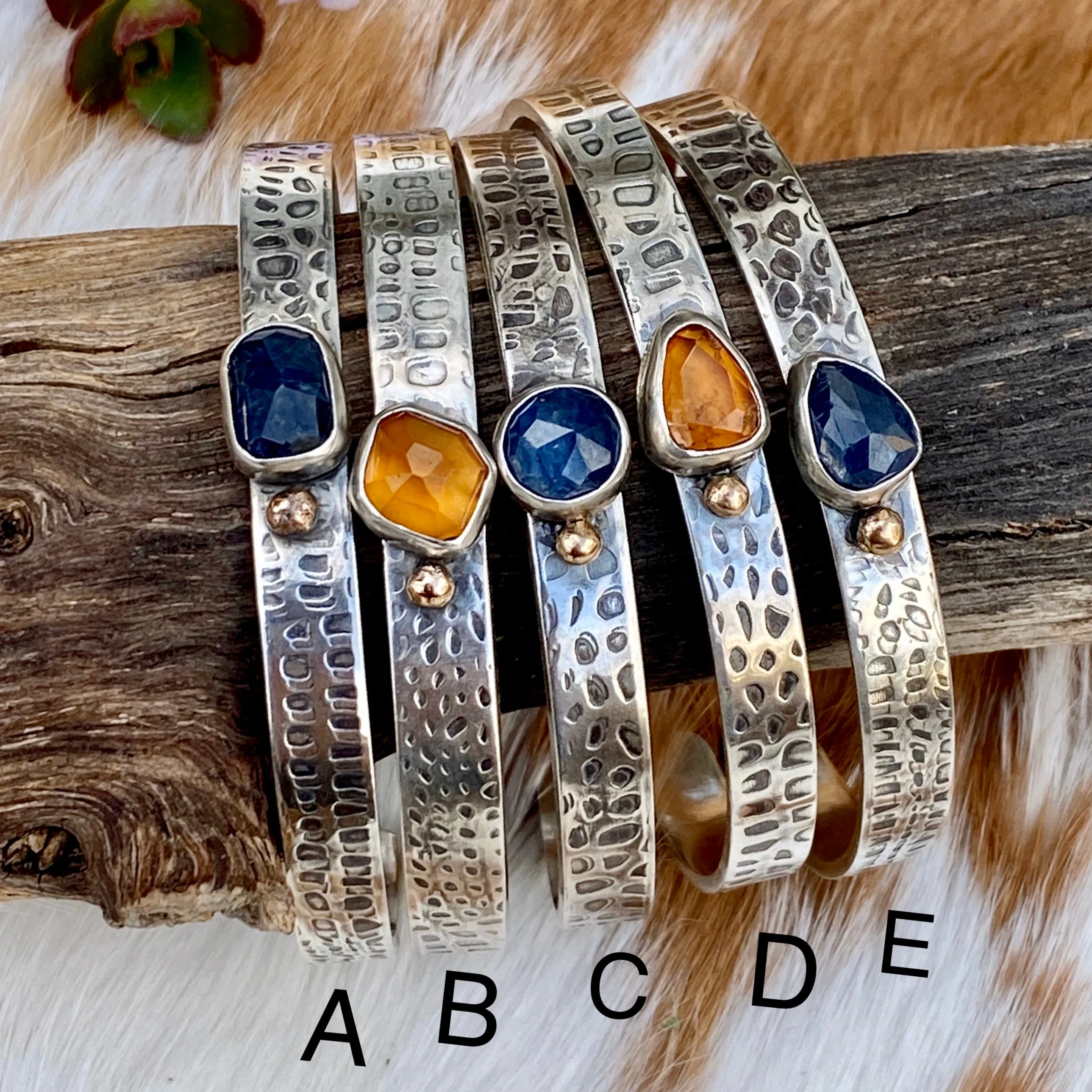 Deep blue Sapphire and golden Garnet and gold snakeskin cuffs